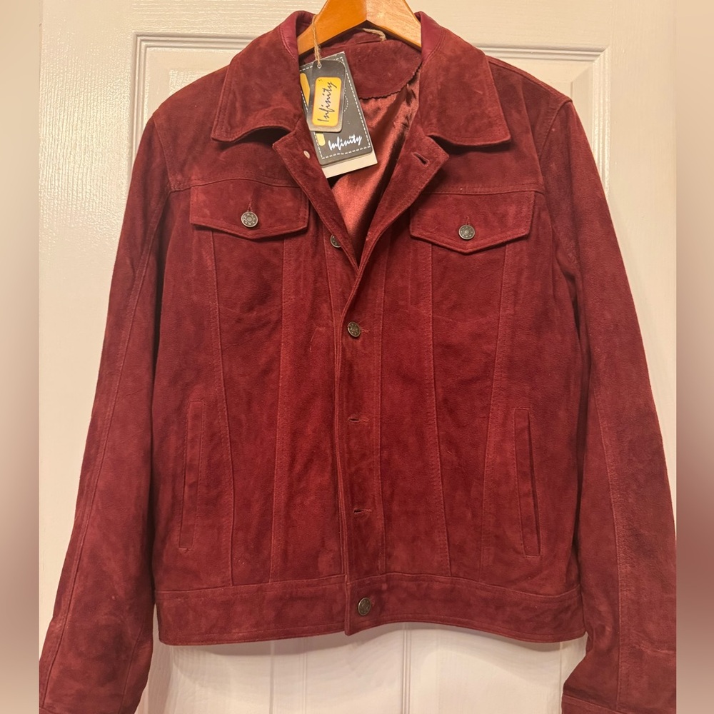 New with tags. Men’s medium beautiful Infinity burgundy suede jacket.